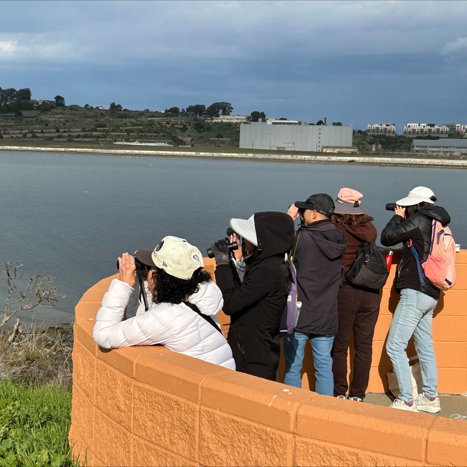 people with binoculars